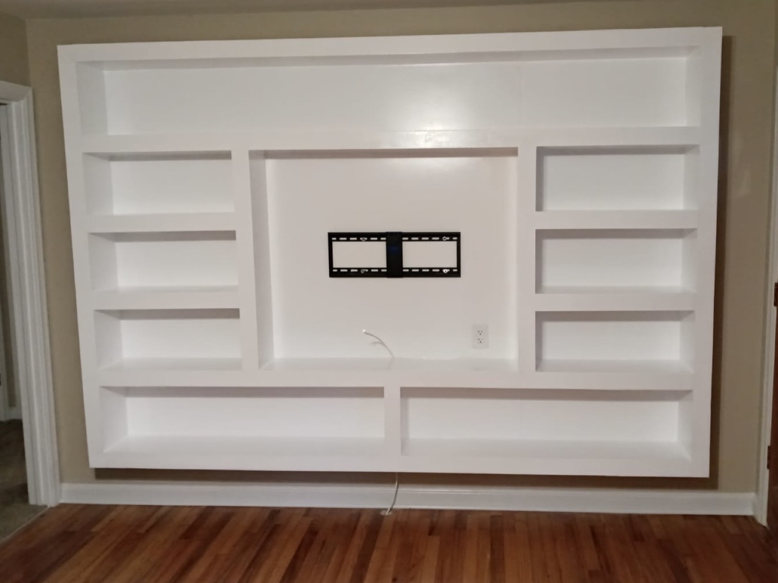 Custom built-in entertainment center with floating television mount