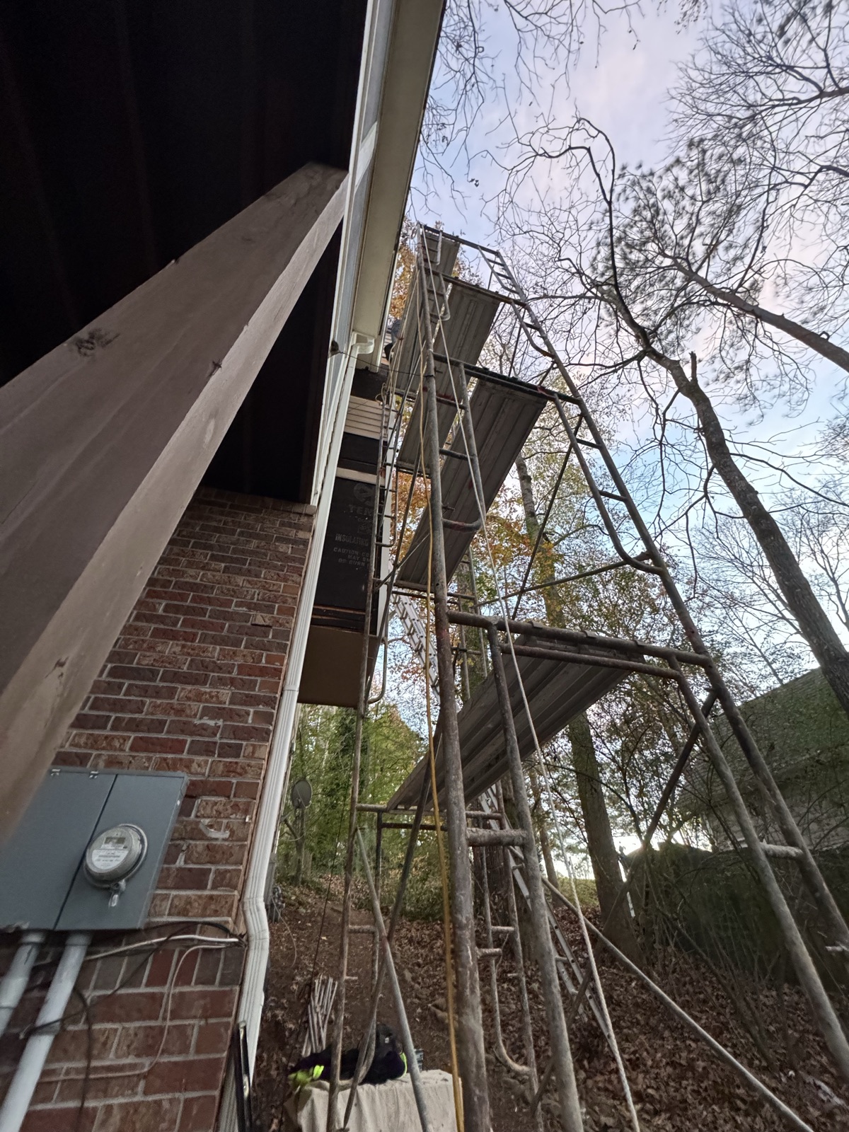 Exterior fascia, trim, chimney and siding repair with fresh paint